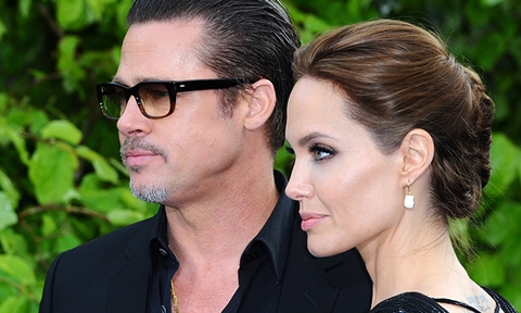 Анджелина Джоли и Брэд Питт на открытии выставки костюмов из фильма Малефисента в Лондоне